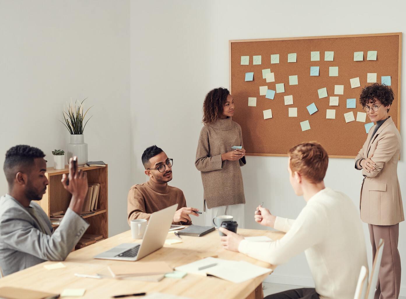 Decorative image: people in a meeting.