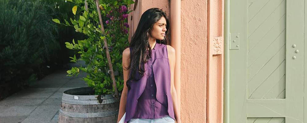 Woman in purple top